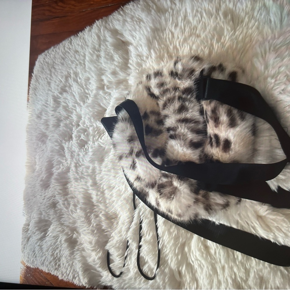 Small fur leopard backpack.